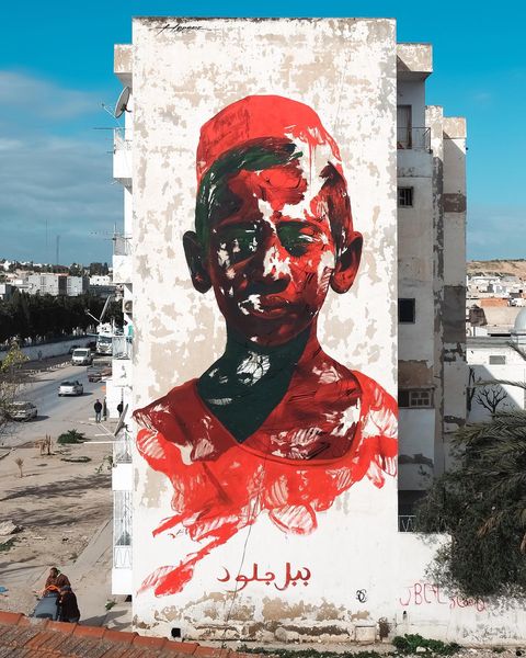 Street art mural à Tunis représentant un visage, art urbain près de chez vous